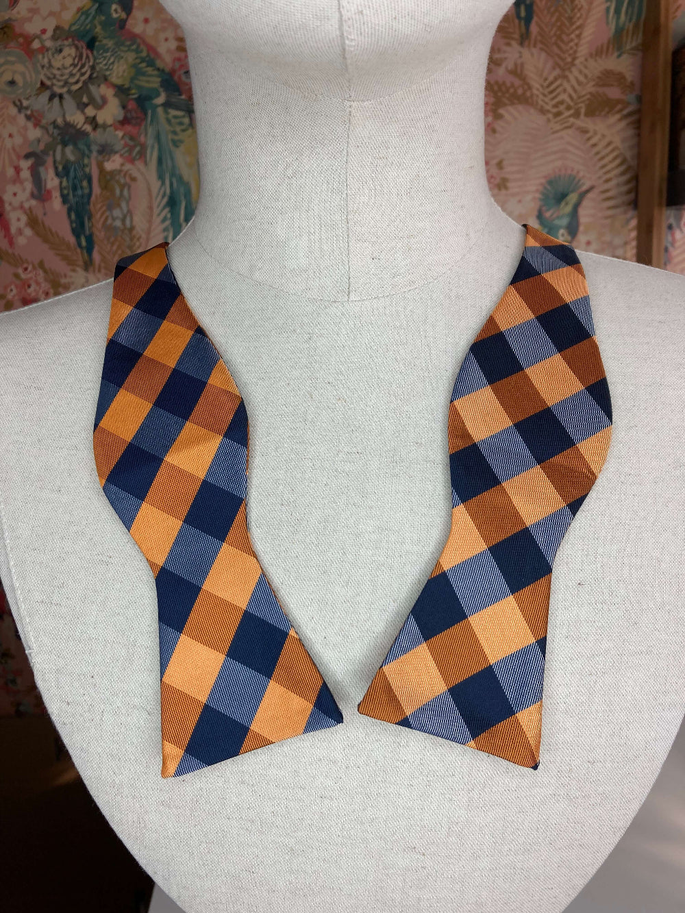 orange and navy blue check self tie bow tie