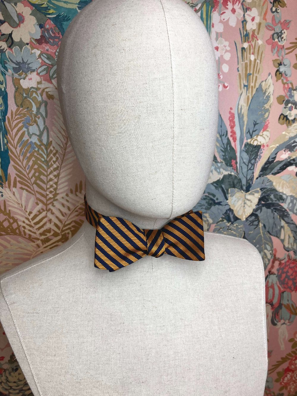 navy blue and old gold striped jacquard silk self tie bow tie